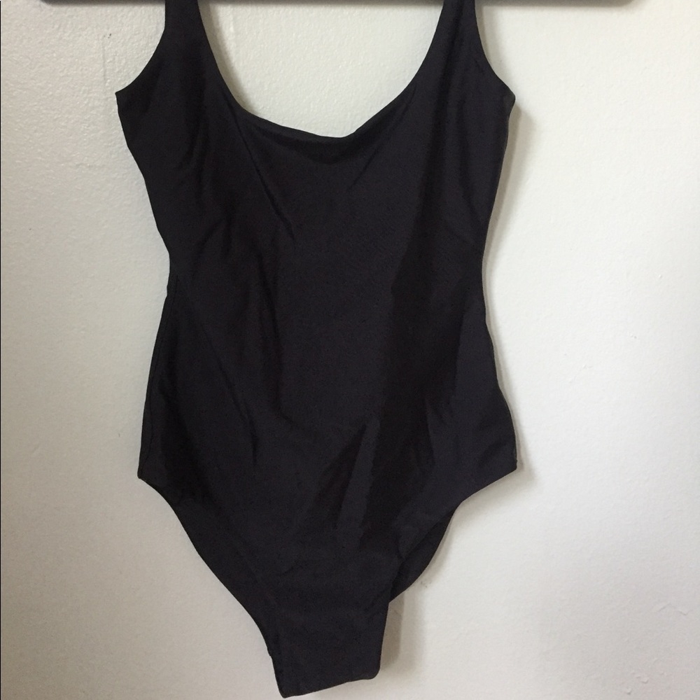 BLACK ONE PIECE SWIM SUIT. NEW CONDITION.